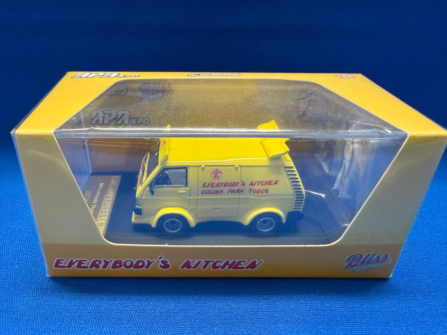 MK Miniatures 1/64 Mitsubishi Delica L300 'Wheels on Meals' Jackie Chan