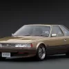 IG3702 Toyota Soarer 2800GT Extra (Z10) Gold/Brown - 1/18 Ignition Model